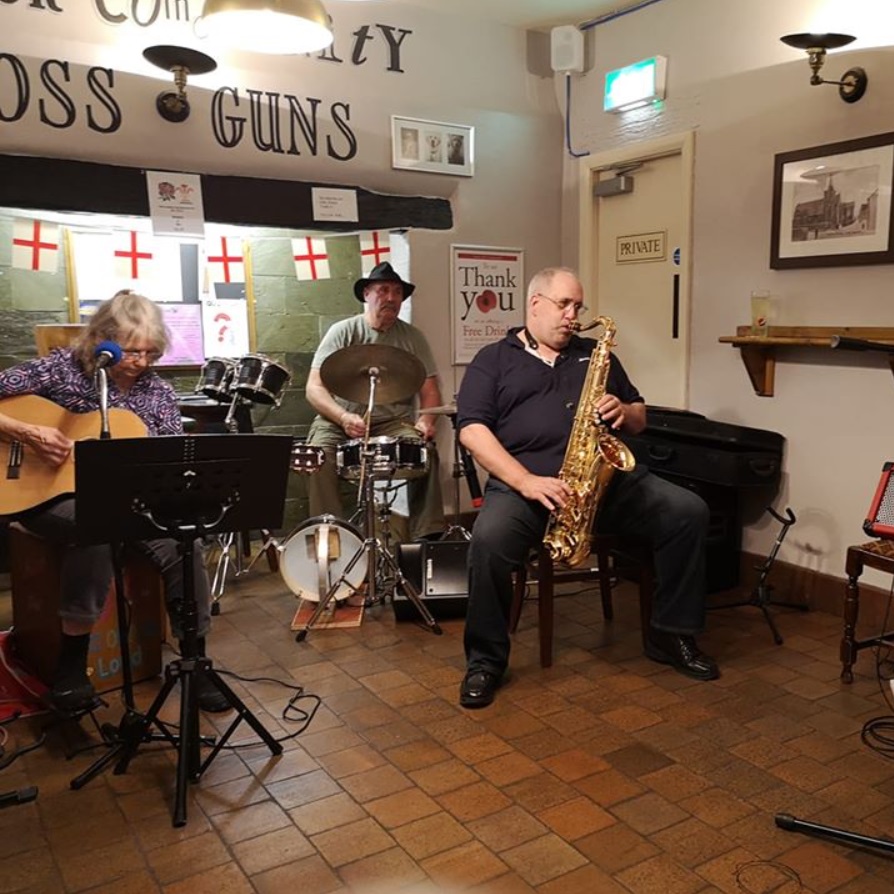 cross guns open mic might